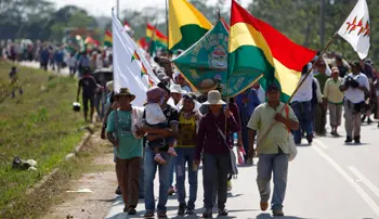 members of the moxos ethnic group march during a protest in trinidad