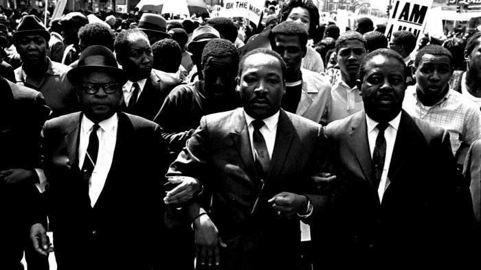 The Rev. Ralph Abernathy, right, and Bishop Julian Smith, left, flank Dr. Martin Luther King, Jr., during a civil rights march in Memphis, Tenn., March 28, 1968.  (AP Photo/Jack Thornell)
