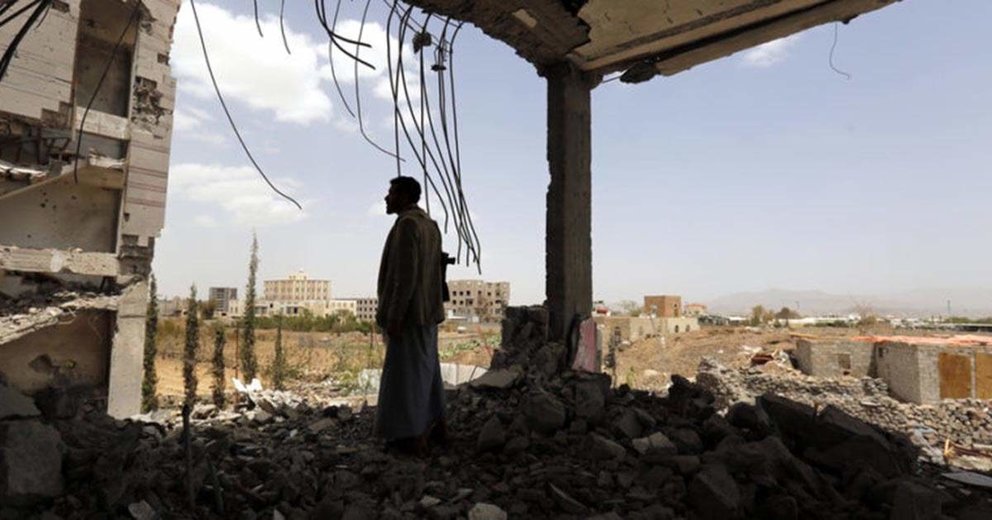Hashim al-Mutawakel, 27, inspects his family building destroyed by two Saudi-led airstrikes at Nahdah neighborhood in the Yemeni capital Sana’a on 08 January 2016. Hashim said that he was not at home that night, and his family members were staying at the basement, so some of them suffered minor injuries. The building suffered two air strikes, destroying it completely.