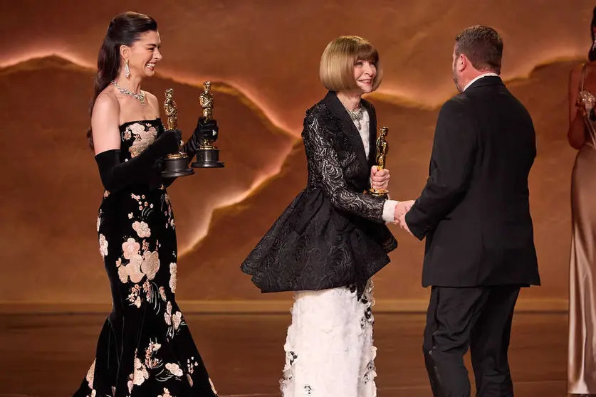 Dame Anna Wintour and Anne Hathaway present the Oscar&reg; for Makeup and Hairstyling to Mike Hill during the 98th Oscars&reg; at the Dolby&reg; Theatre at Ovation Hollywood on Sunday, March 15, 2026.