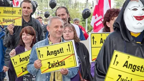 Sindicalistas alemanes expresan su solidaridad con los trabajadores de T-Mobile EEUU en un encuentro de accionistas de Deutsche Telekom en 2011