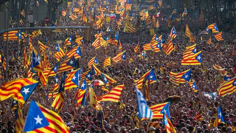 BARCELONA, SPAIN - SEPTEMBER 11:  Demonstrators march during a Pro-Independence demonstration as part of the celebrations of the National Day of Catalonia on September 11, 2014 in Barcelona, Spain. Thousands of Catalans celebrating the 'Diada de Catalunya', are using it as an opportunity to hold demonstrations to demand the right to hold a self-determination referendum next November.  (Photo by David Ramos/Getty Images)