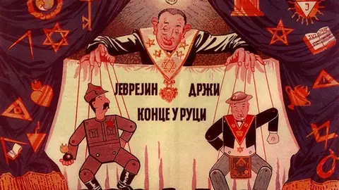 Cartel de la Exposici&oacute;n antimas&oacute;nica de 1941: el juda&iacute;smo controlando al comunismo (I&oacute;sif Stalin) y a la masoner&iacute;a (Winston Churchill). Wikipedia