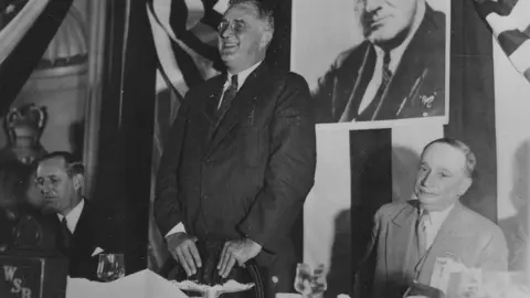 Franklin_D._Roosevelt,_Governor_R.B._Russell,_and_Senator_Cohen_in_Atlanta,_Georgia_-_NARA_-_197048