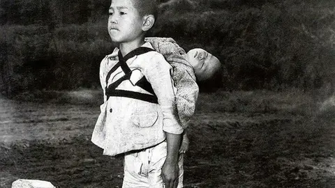 the-boy-standing-by-the-crematory-is-a-historic-photograph-v0-c51c7ynlvcre1 (1)