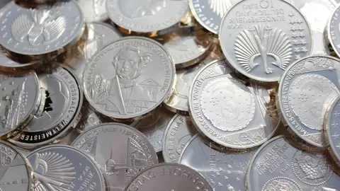 moneda plata