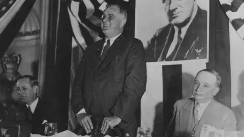 Franklin_D._Roosevelt,_Governor_R.B._Russell,_and_Senator_Cohen_in_Atlanta,_Georgia_-_NARA_-_197048 (1)