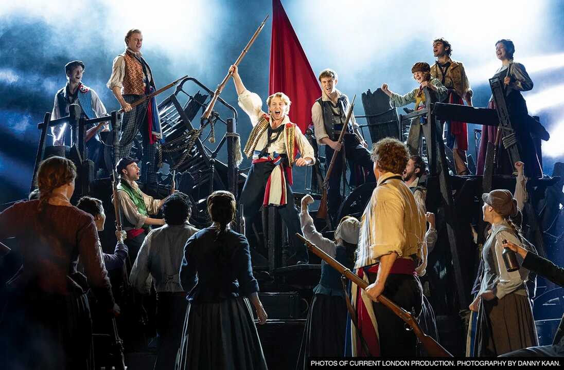 Robson_Broad_as_Enjolras_and_Cast_Photo_by_Danny_Kaan
